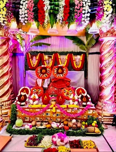 Devi alankara under a pink mandap